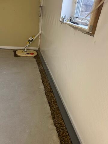 During: Our Foreman, Kiko, and his crew successfully secured all the waterproofing products in the basement. A