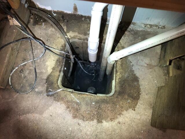 Before: Our Design Specialist confirmed the sump pump required replacement and the entire basement needed to be waterproofed.