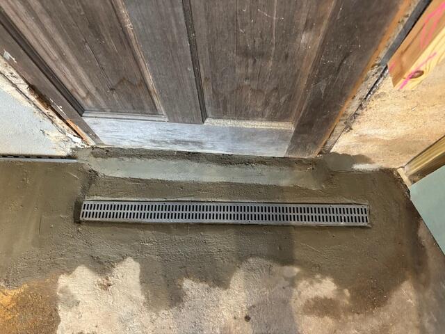 Positioned at the basement entry, our TrenchDrain System captures water before it can enter, providing an effective barrier to prevent flooding and moisture buildup.