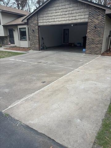 During: Our Foreman, Bryce, and his crew worked hard to lift and level the concrete back to its original level.