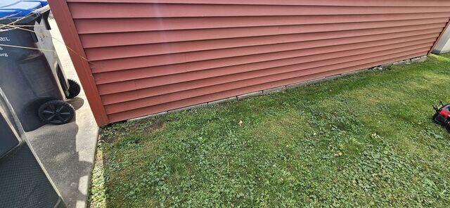 The garage showing signs that it was sinking on one side