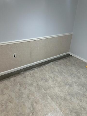 Our EverLast Wall Panels were installed to replace water-damaged surfaces with a clean, durable, and moisture-resistant finish.