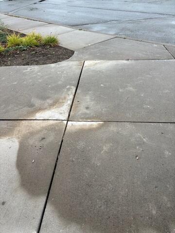 This high-traffic zone had become unsafe and uneven due to shifting ground and heavy use. Our concrete-leveling service eliminated the trip hazards and created a level surface that helps protect the property and reduce future liability.