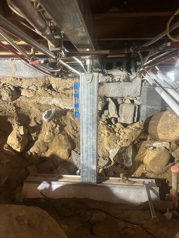 SmartSump was installed to ensure any sagging beams are secured.