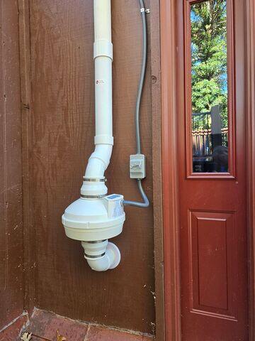 Radon Fan - Premium radon fan with moisture guard installed to provide strong, reliable suction for continuous radon reduction.