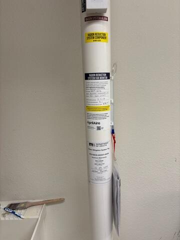 During: Our Radon Sales + Service Technician, Jackson, secured the system in and outside the home.