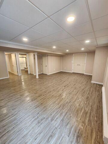 Used to add a stylish, wood-like finish without the risk of warping or water damage, our ThermalDry Elite Flooring creates a warm, inviting space while offering superior protection against basement moisture.