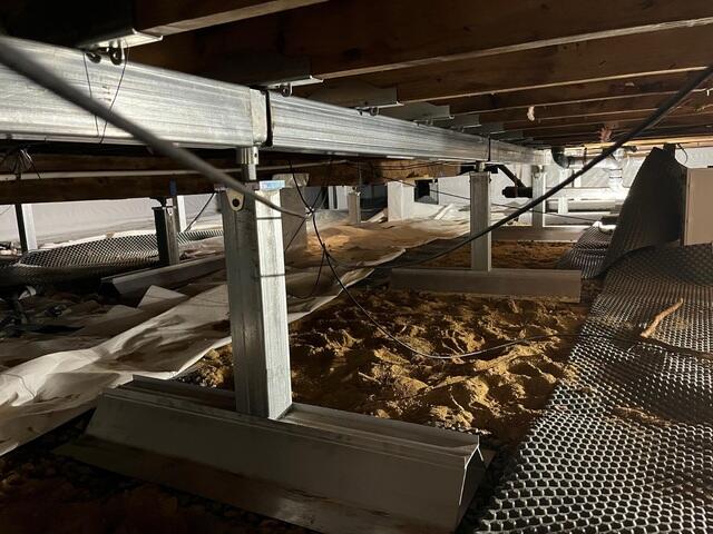 Our SmartJacks were installed to stabilize weakened support beams and restore structural integrity affected by moisture-related deterioration.