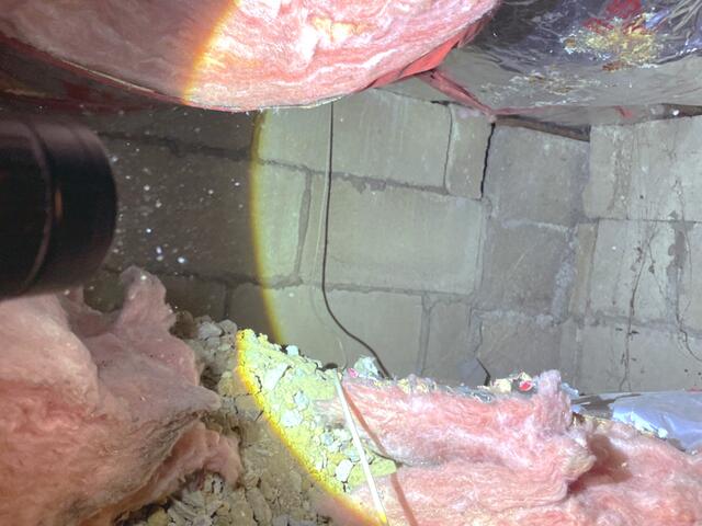 In addition to the porous walls, air is leaking through the unsealed and uninsulated rim joists and sill plates.