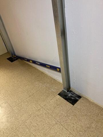 During: Our Foreman, Nanga, and his crew successfully secured the PowerBraces on the struggling walls.