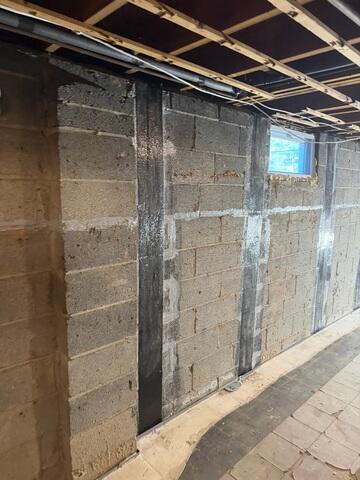 Our CarbonArmor Wall Reinforcement System was added to stabilize bowing walls, prevent further movement, and ensure the structural integrity of the basement, safeguarding the home against long-term foundation damage.