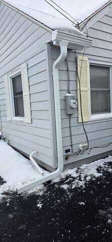 Gutter Shutter and Downspout