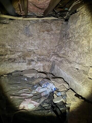 Before: Our Design Specialist, Dustin, recommended encapsulating the entire crawl space.