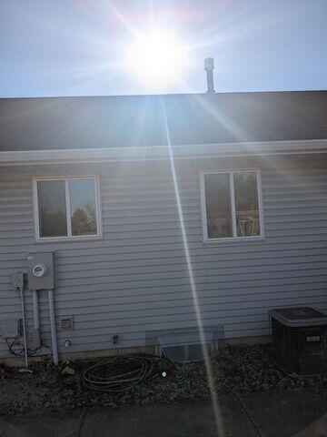 Before: Our Design Specialist, Kyle, recommended installing a Radon Mitigation System outside the home.