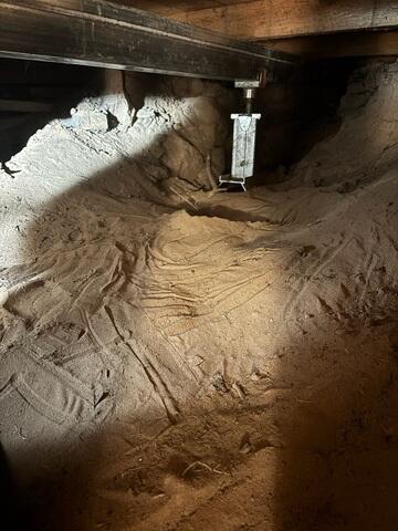 During: Our crew installed a new supplemental beam and SmartJacks to ensure the crawl space is properly supported.