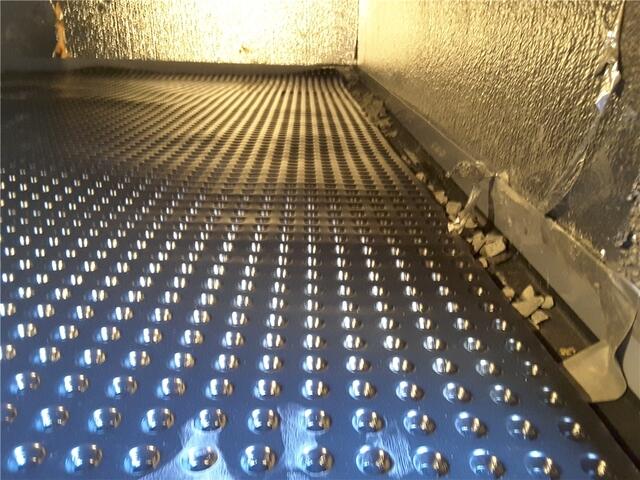 SilverGlo was installed on the walls to provide insulation. Drainage Matting was laid across the floor in the crawl space to move any standing water around.