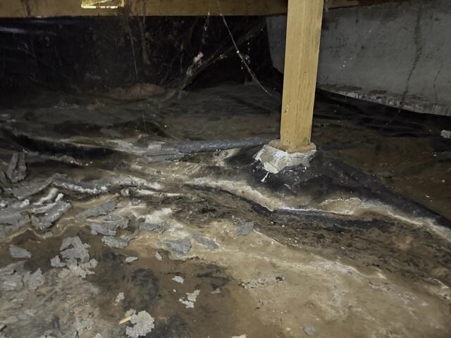 When water has no where to go, it becomes stagnant and is absorbed through porous material causing it to look like this and damages the concrete footings.