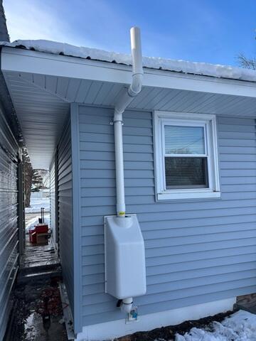 After: Jackson successfully installed the Radon Mitigation System, and the homeowner was delighted by the work completed.
