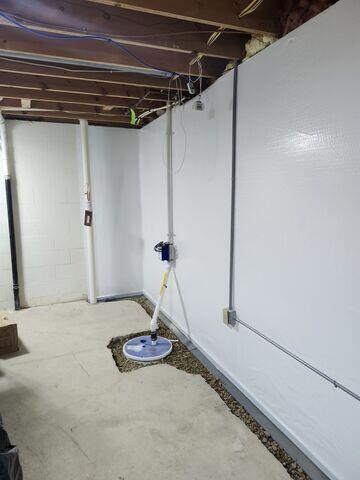 During: Our Foreman, Lane, and his crew successfully secured all the waterproofing products in the basement.