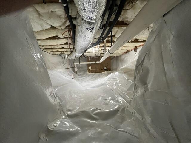 Now the crawl space is fully encapsulated with our CleanSpace vapor barrier.
