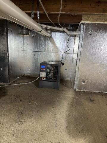 SaniDry Sedona was placed in the crawl space to dry the air.