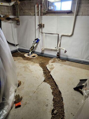 During: Our Design Specialist, Darin, recommended securing several waterproofing products throughout the home.