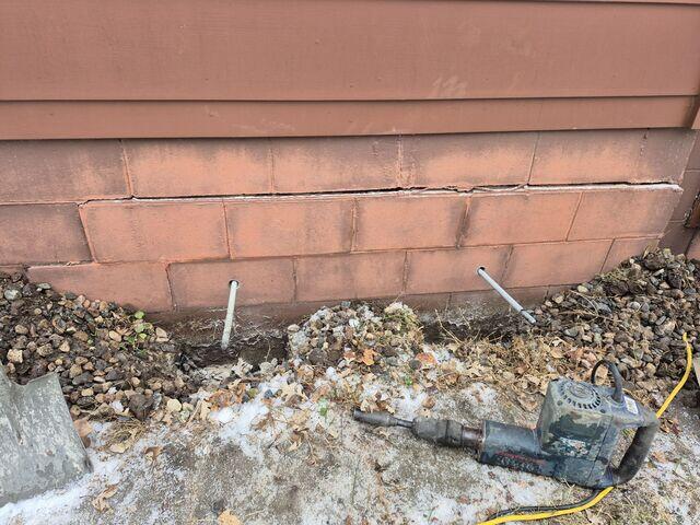 During: Our Design Specialist, Darin, recommended installing two GeoLock Wall Anchors along the struggling walls.