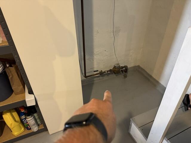 Before: Our Design Specialist, Brady, recommended waterproofing the leaky floors and stabilizing the cracked walls.