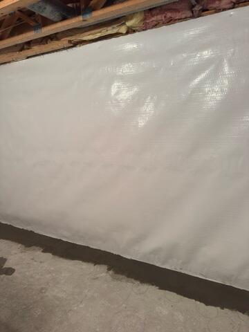 During: Our Foreman, Roel, and his crew succesfully secured all the waterproofing products in the basement.