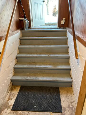 Before: Our Design Specialist, Ryan, recommended waterproofing the perimeter of the basement.