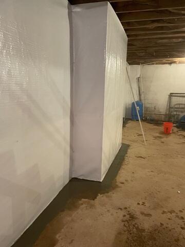 Waterguard, a interior drainage system was installed along with a triple Safe Sump pump and Clean Space vapor barrier. The basement is now protected from any more water intrusion and further damage.