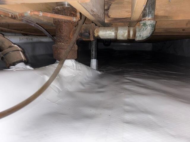 During: Our Foreman, Jesus, and his crew traveled to the home to begin the encapsulation.