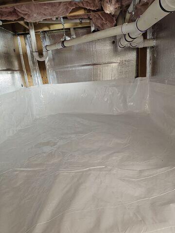 CleanSpace Wall Panels were installed to create a durable, moisture-resistant barrier along the crawl space walls. This system prevents water from penetrating the walls, protects against mold and mildew, and maintains a clean, dry, and secure crawl space that safeguards the home's foundation and overall structural health.