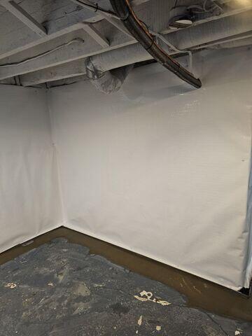 CleanSpace Wall Panels were installed to create a durable, moisture-resistant barrier along the basement walls.