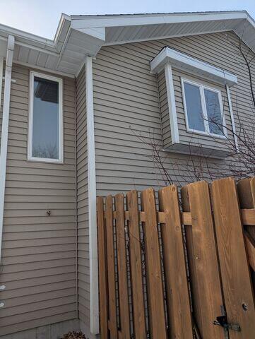 Before: Jackson, our Radon Sales & Service Technician, recommended installing a Radon Mitigation System outside the home.