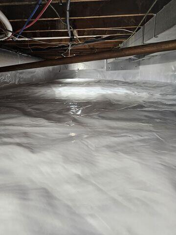 CleanSpace Wall Panels were installed to provide a durable, moisture-resistant barrier along the crawl space walls. By stopping water intrusion and limiting the risk of mold and mildew, these panels keep the space dry, clean, and structurally protected.