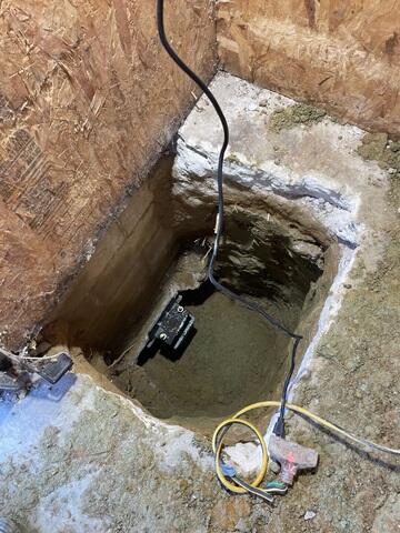 During: Our Foreman, Victor, and his crew secured 12 Helical Piers around the exterior.