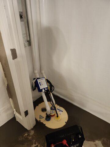 During: Our Foreman, Arturo, and his crew secured waterproofing products throughout the basement.