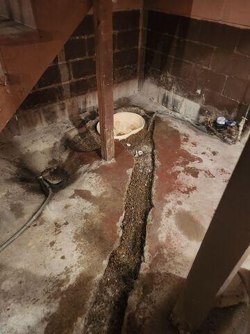 During: Our Foreman, Lane, and his crew secured the waterproofing products throughout the basement.