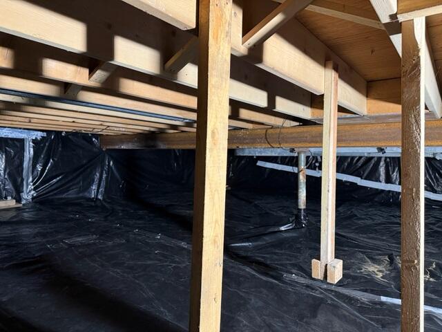 Before: Our Design Specialist, Chuck, recommended properly encapsulating the entire crawl space.