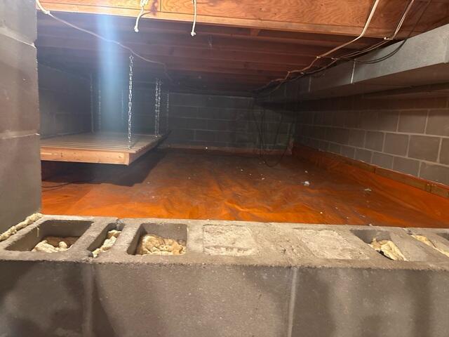 Before: Our Design Specialist, Gary, recommended encapsulating the entire crawl space.