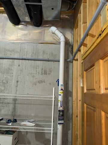 During: Our Foreman, Dakota, and his crew secured the Radon Mitigation System in the home.