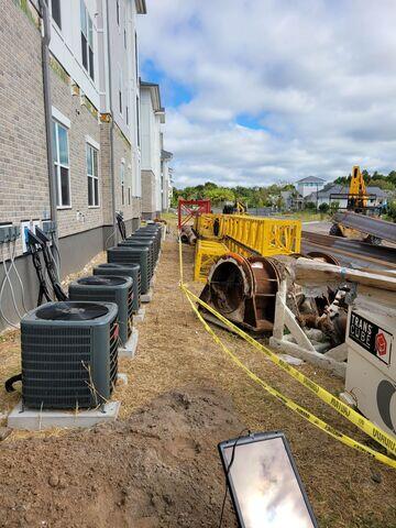 East wall of Aventon Lana housing complex prior to removal of AC units.