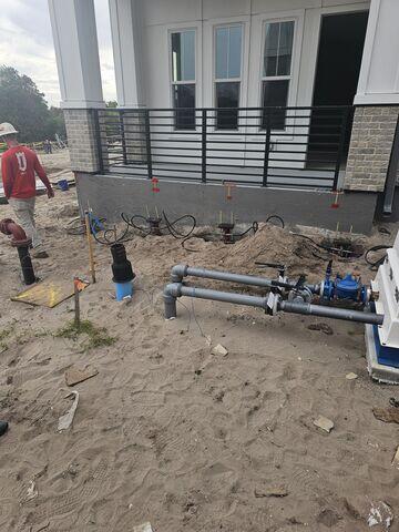 Retrofit brackets with lift cylinders attached.