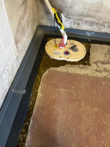 During: Our Foreman, Juan, and his crew secured the waterproofing products throughout the basement.