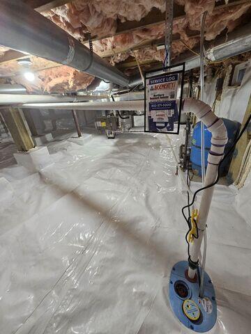 CleanSpace® Vapor Barrier System
The CleanSpace Vapor Barrier System was installed to fully encapsulate the crawl space, sealing out ground moisture and helping create a cleaner, more controlled environment beneath the home.

Smart Sump Pump System
A Smart Sump Pump System was installed to effectively collect and remove groundwater from the crawl space, providing reliable water management and protection during heavy rain events.