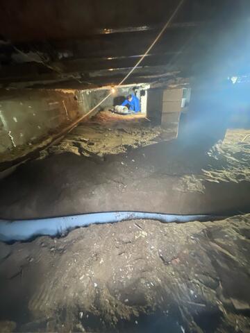 During: The Foreman, Victor, and his crew worked hard to secure the products throughout the crawl space.