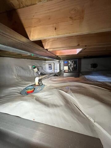 To effectively manage water intrusion, we installed our SmartSump System to collect and pump out water before it could spread throughout the crawl space.