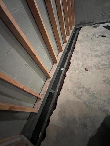 During: Our Design Specialist, Jason, recommended securing WaterGuard around the basement perimeter.