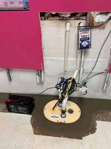 The sump pump is now in place to safely collect and discharge groundwater away from the building.